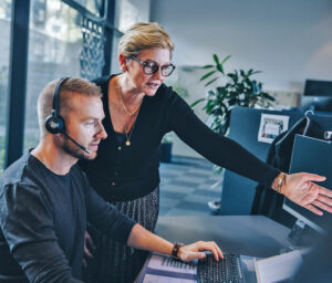 Two Employees Working on the Computer
