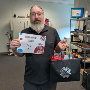 Employee Holding Certificate