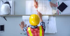 Construction Workers with Plans