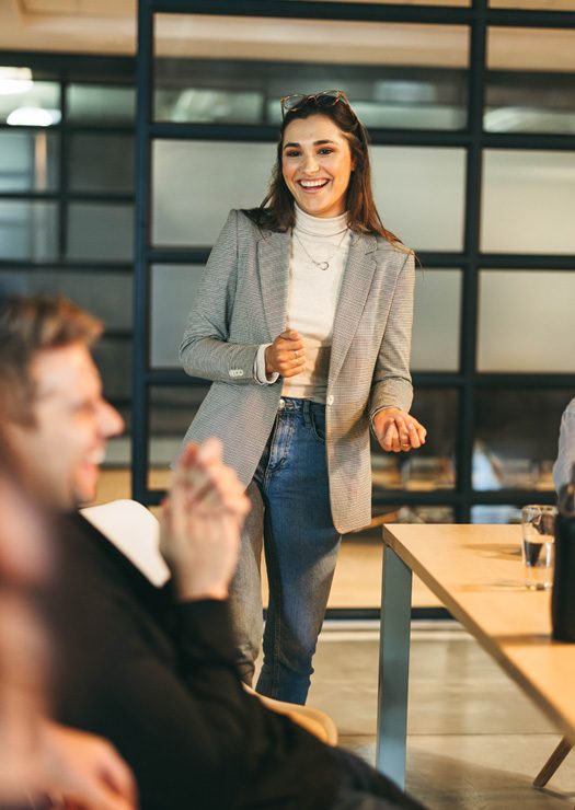 666461504 Women Laughing with Employees