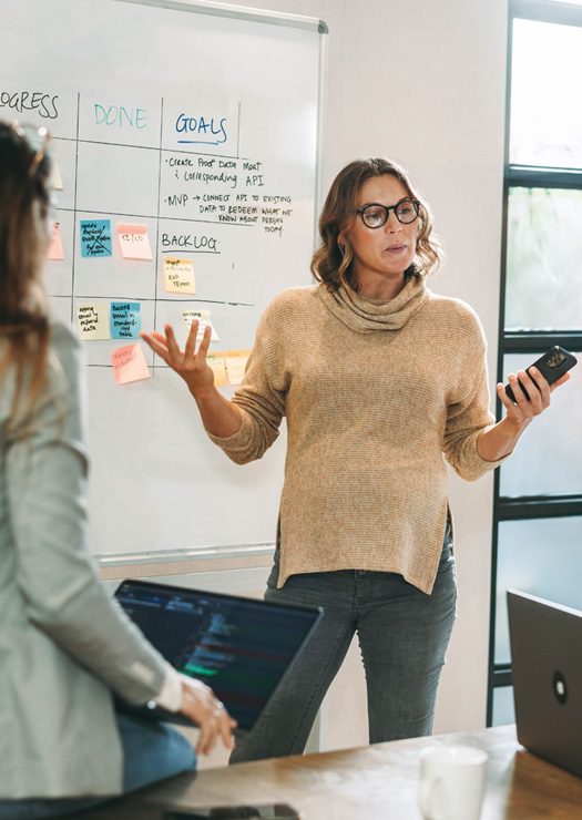 Women Leading Whiteboard Session